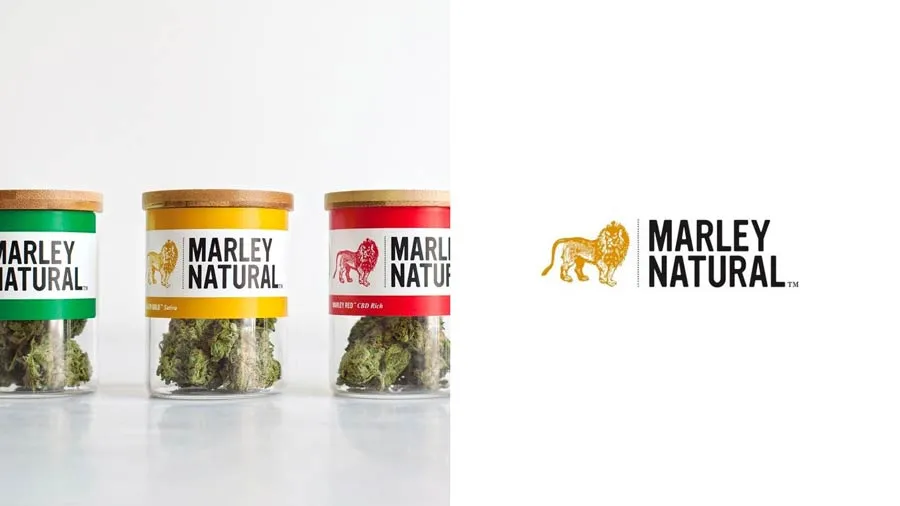 Marley Natural cannabis packaging using rasta colors and a gold lion illustration